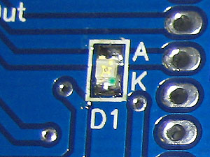 Solder all the smd resistors and the LED.  Use a tweezer to hold the smd parts